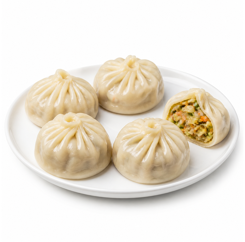 steamed-momos-5-pcs Steamed Momos (5 Pcs) - Image 1